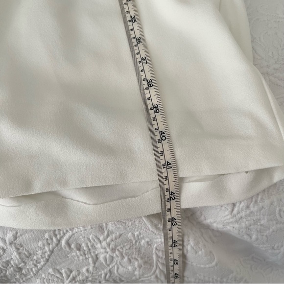 With A Puff Lulus white jumpsuit - Picture 9 of 9